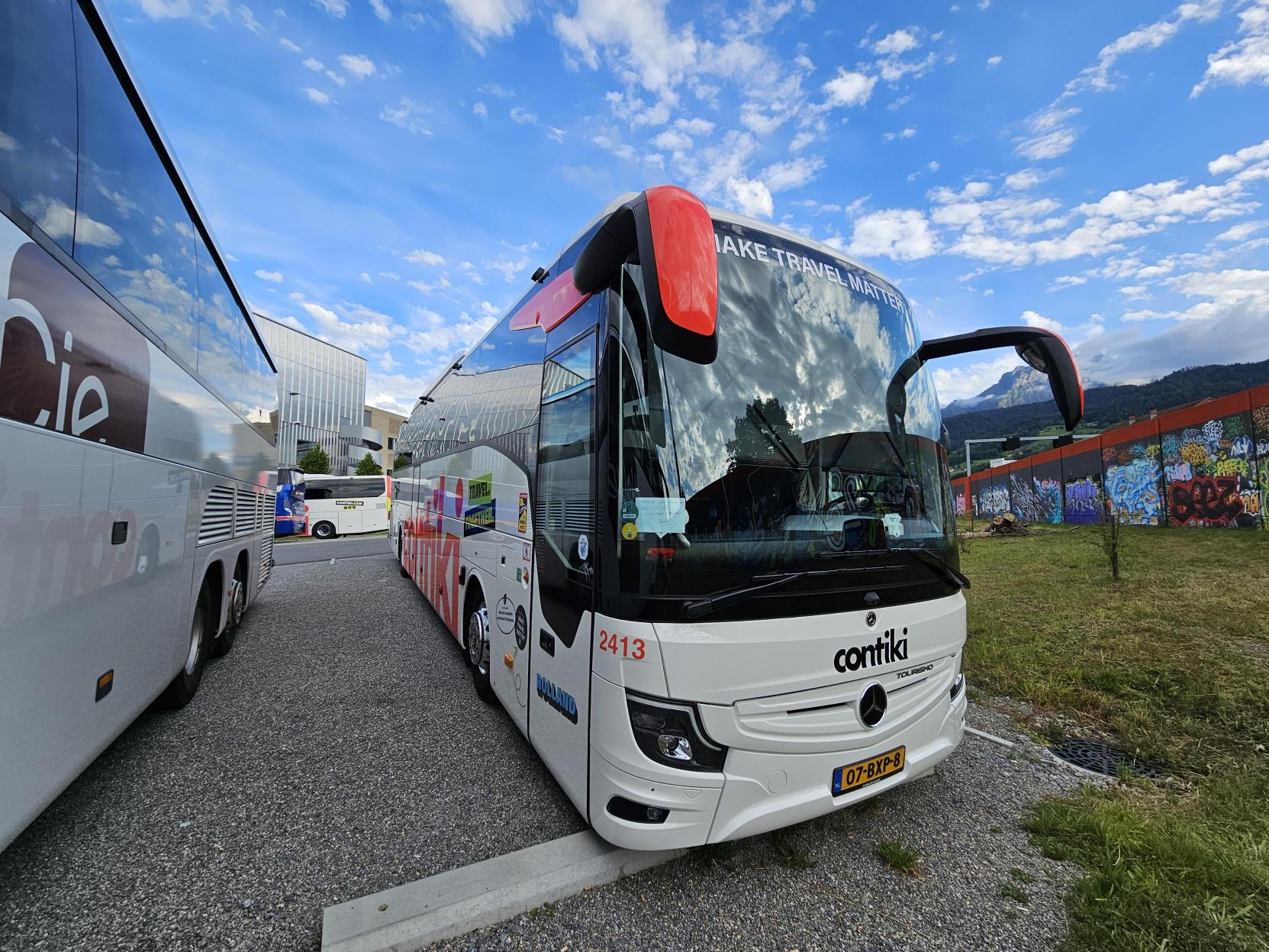 Contiki-coach-parked-with-graffitis-on-the-side